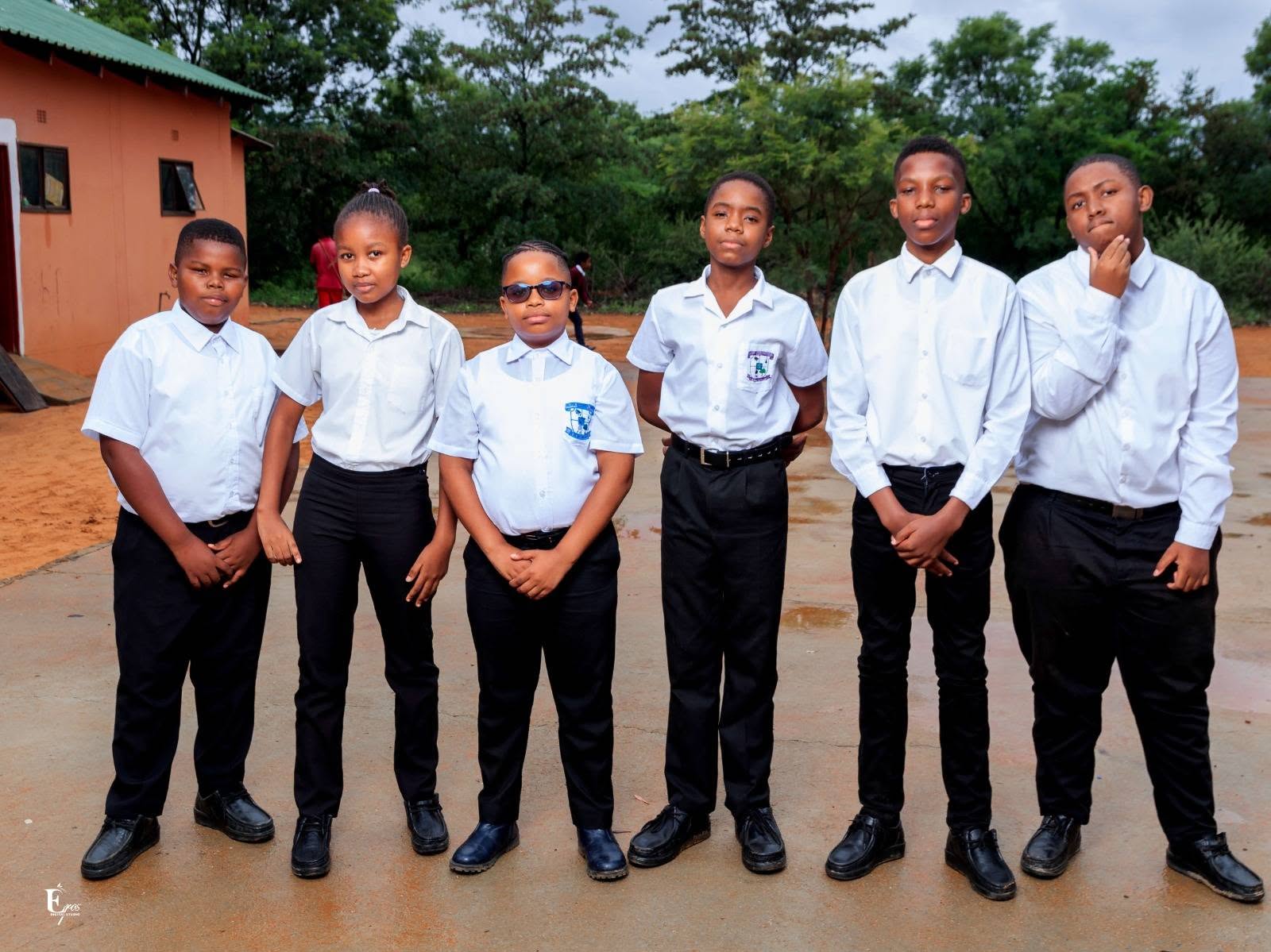 Elyte learners together in their school environment